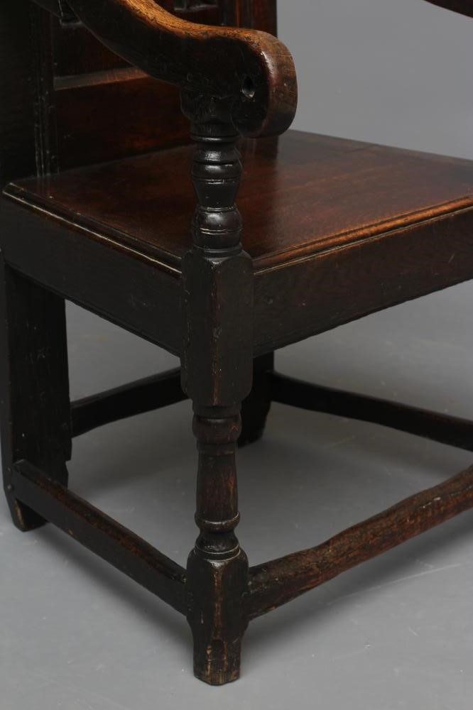 A JOINED OAK ARMCHAIR Image