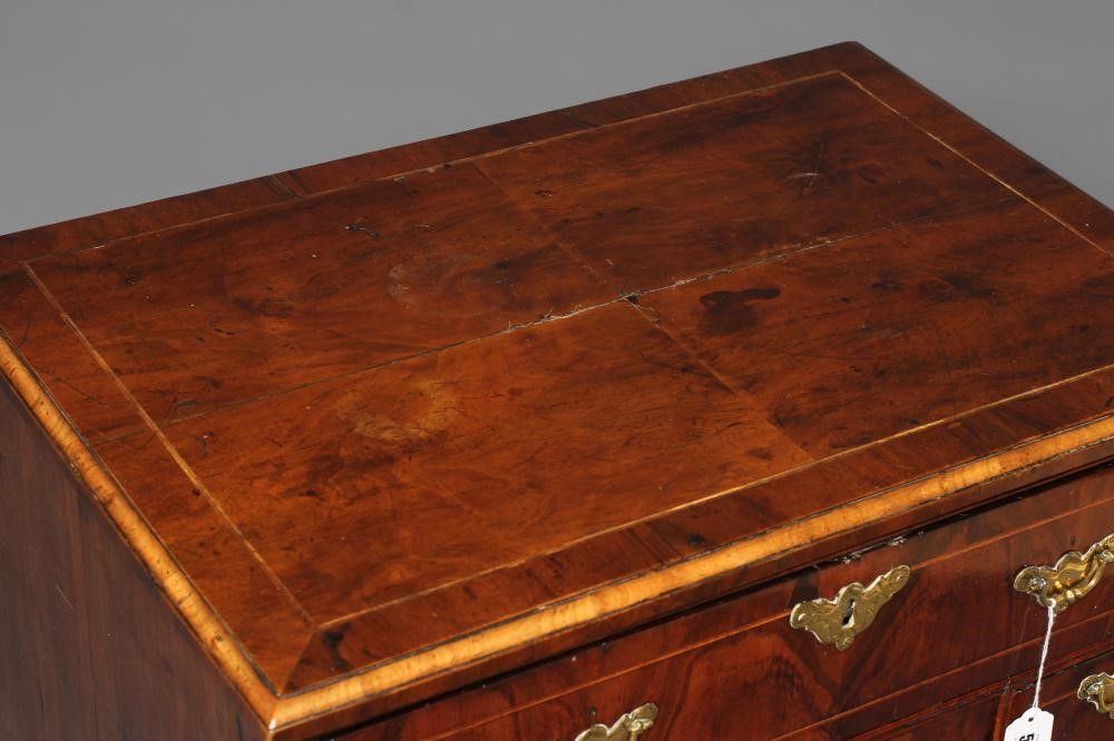 A GEORGE I AND LATER WALNUT KNEEHOLE DESK Image