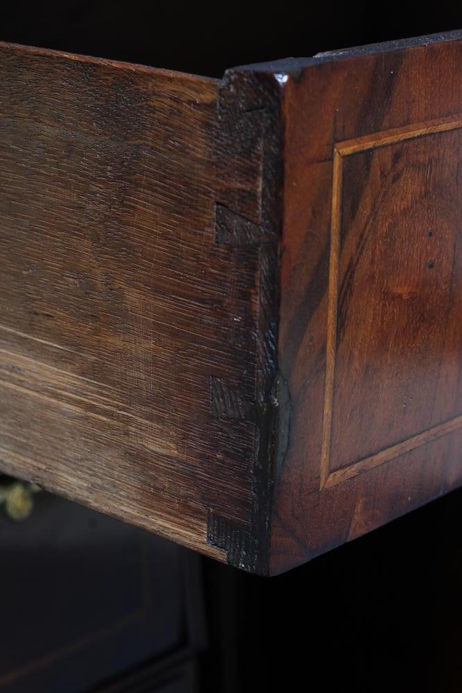 A GEORGE I AND LATER WALNUT KNEEHOLE DESK Image