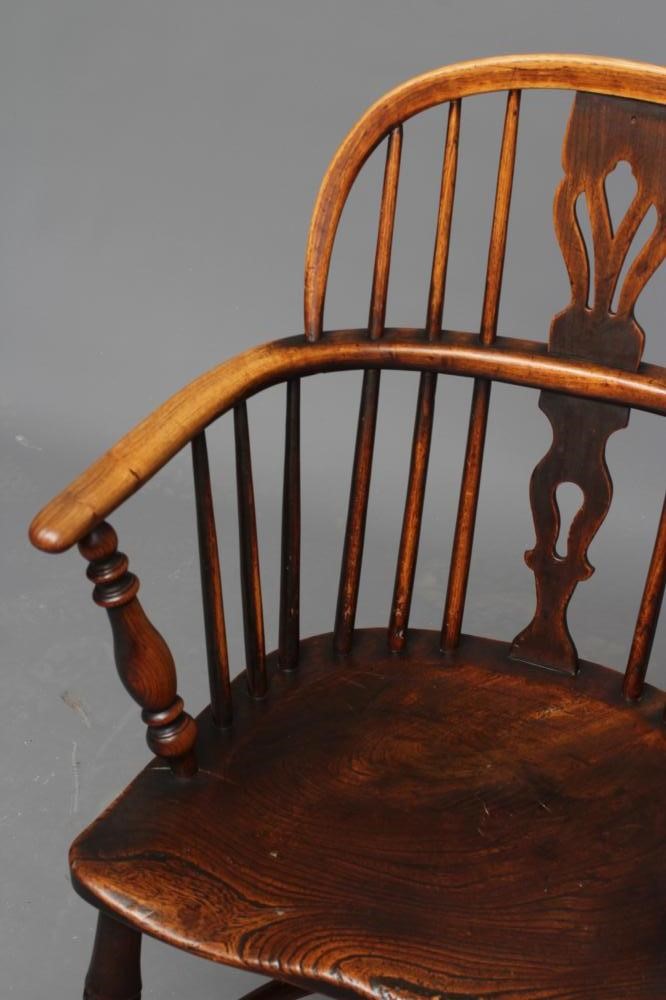 AN ASH AND ELM WINDSOR ARMCHAIR Image