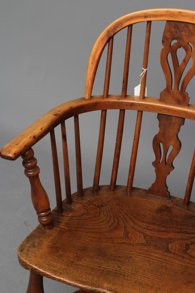 A YEW WINDSOR ARMCHAIR Image