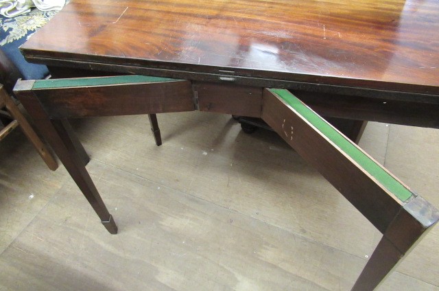 A GEORGIAN MAHOGANY FOLDING CARD TABLE Image