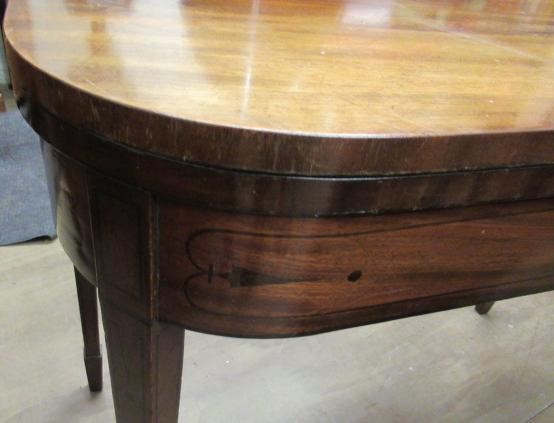 A GEORGIAN MAHOGANY FOLDING CARD TABLE Image