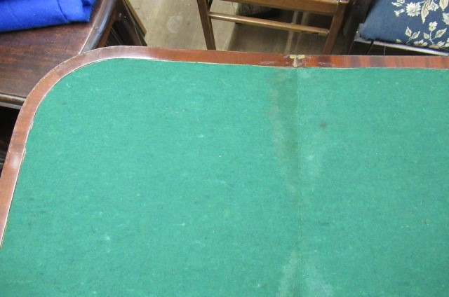 A GEORGIAN MAHOGANY FOLDING CARD TABLE Image