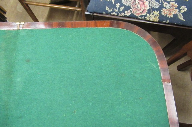 A GEORGIAN MAHOGANY FOLDING CARD TABLE Image