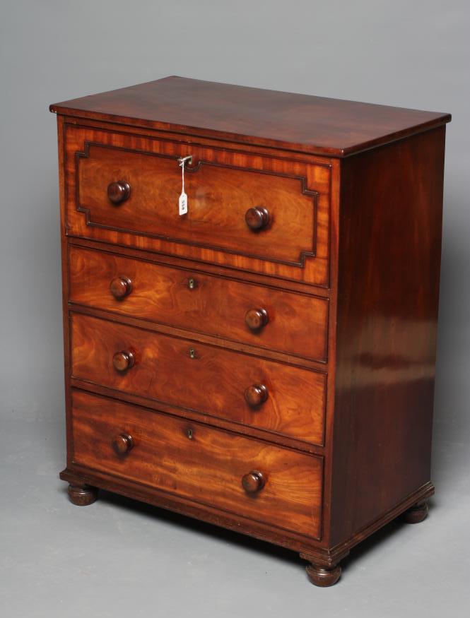 A LATE GEORGIAN MAHOGANY SECRETAIRE CHEST Image