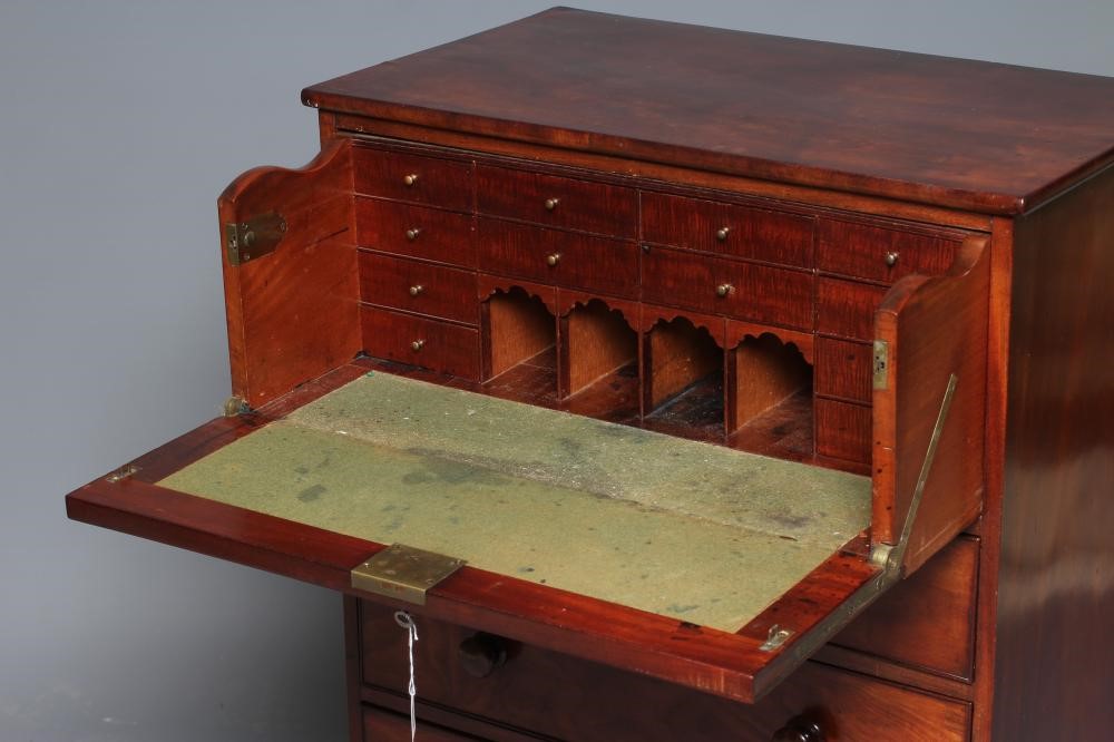 A LATE GEORGIAN MAHOGANY SECRETAIRE CHEST Image