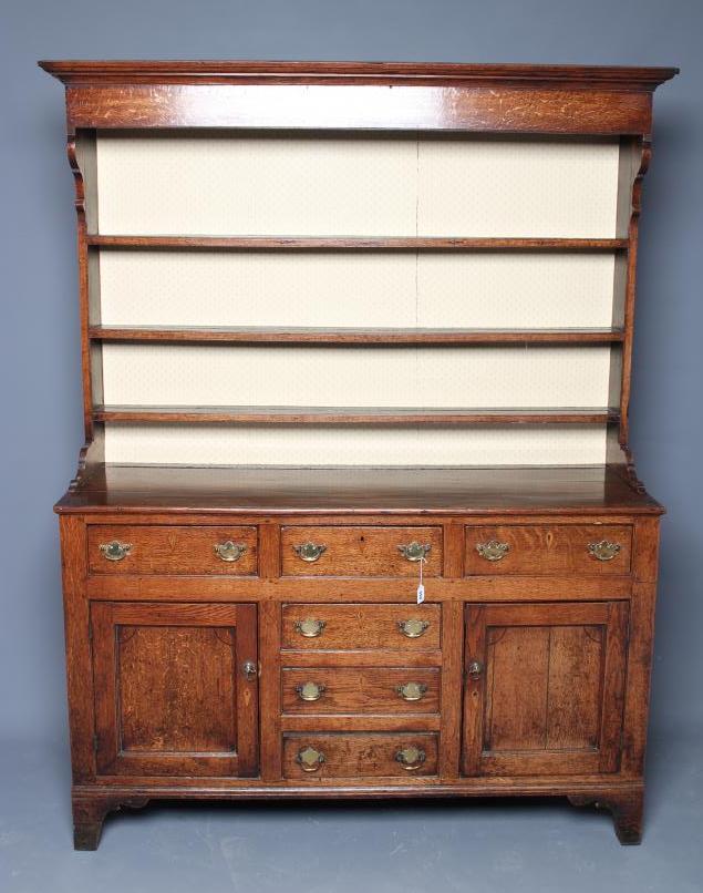 AN OAK ENCLOSED DRESSER Image