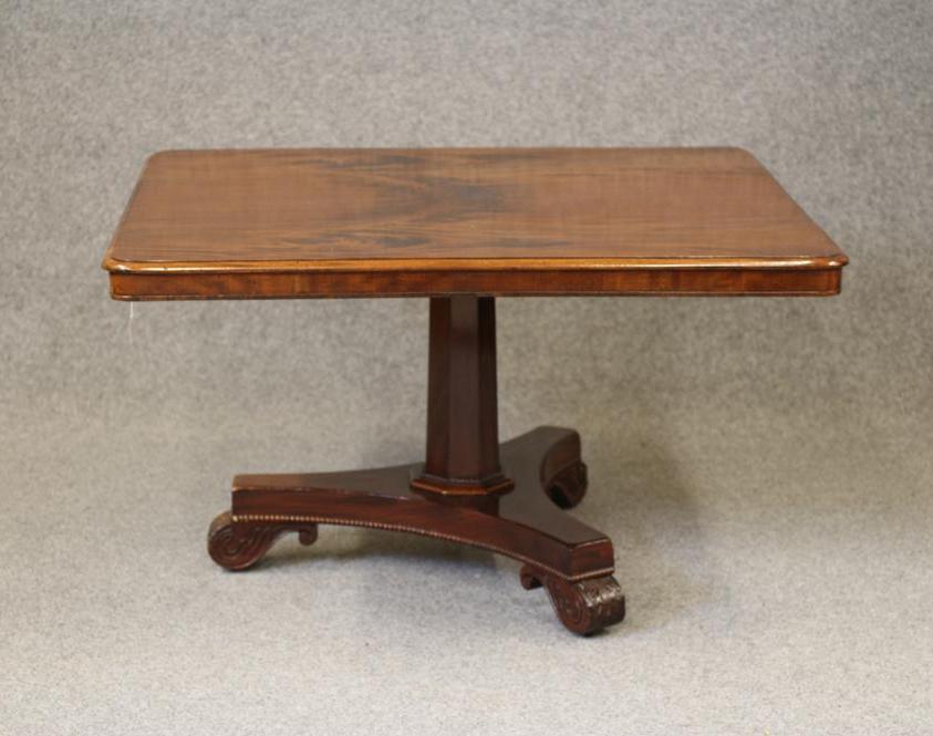 AN EARLY VICTORIAN MAHOGANY BREAKFAST TABLE Image