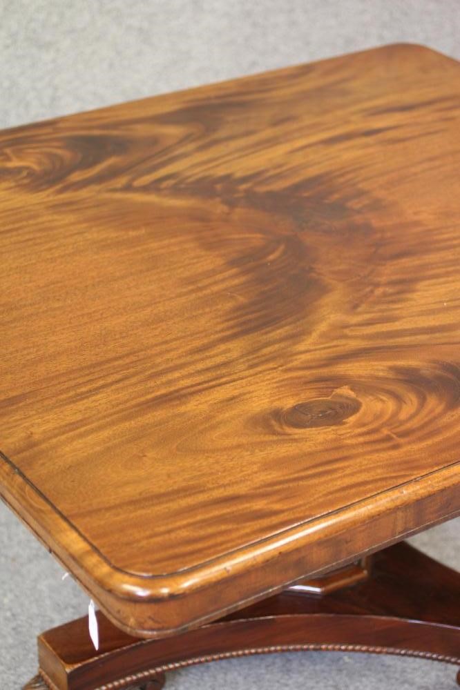AN EARLY VICTORIAN MAHOGANY BREAKFAST TABLE Image