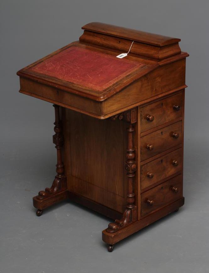 A VICTORIAN WALNUT DAVENPORT Image