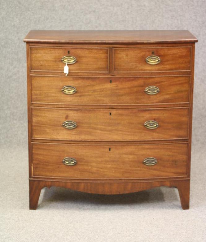 A REGENCY MAHOGANY BOWED CHEST Image
