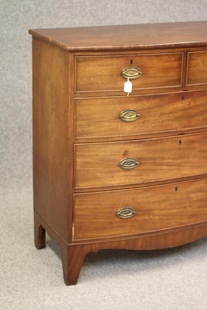 A REGENCY MAHOGANY BOWED CHEST Image