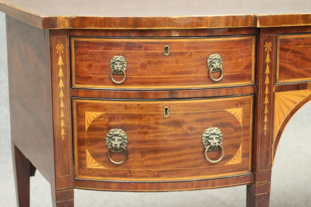 A GEORGIAN MAHOGANY AND INLAID SIDEBOARD Image