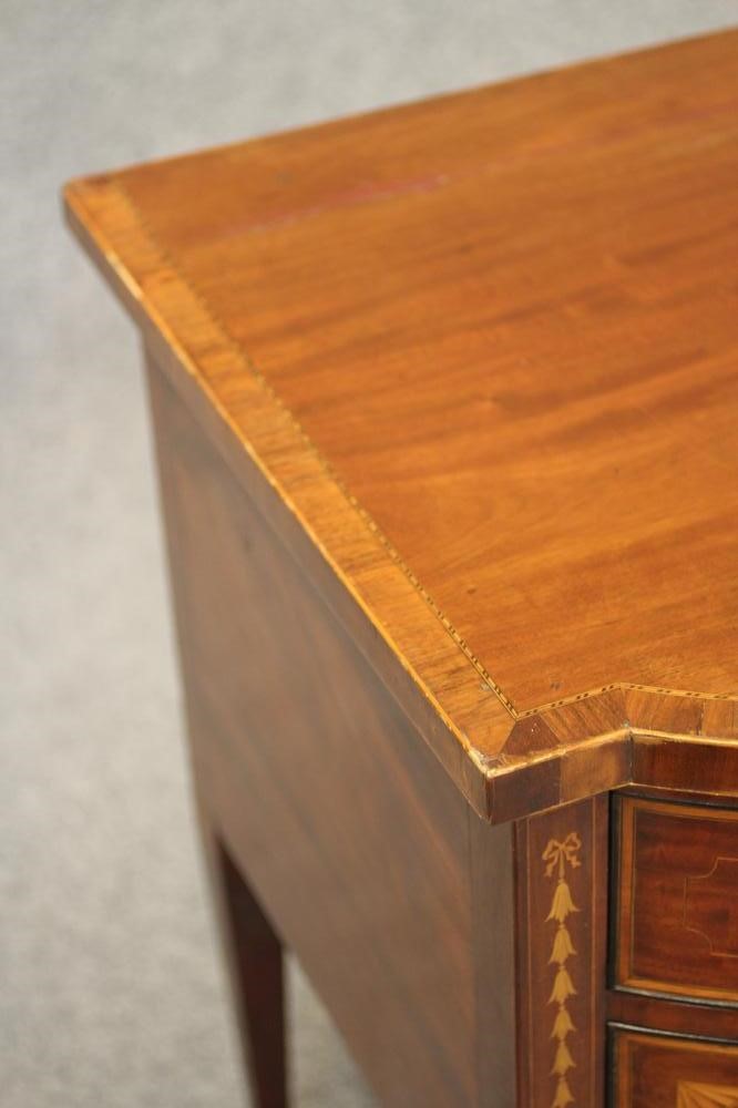 A GEORGIAN MAHOGANY AND INLAID SIDEBOARD Image