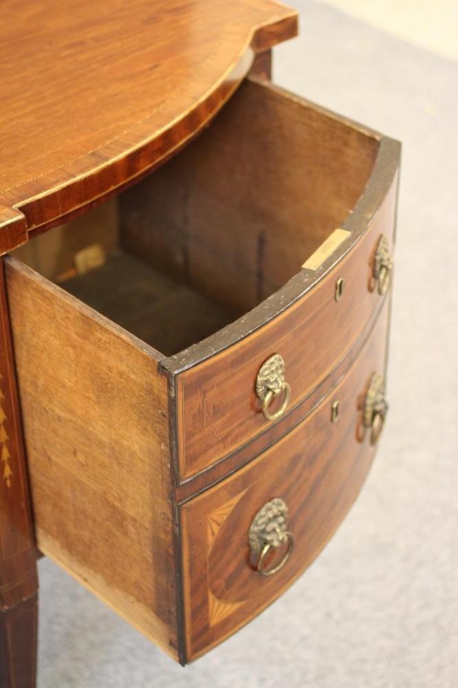 A GEORGIAN MAHOGANY AND INLAID SIDEBOARD Image
