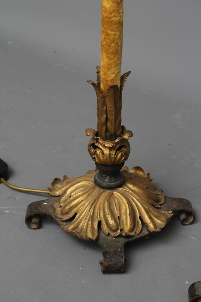 A PAIR OF ITALIAN WROUGHT IRON AND PARCEL GILT STANDARD LAMPS Image