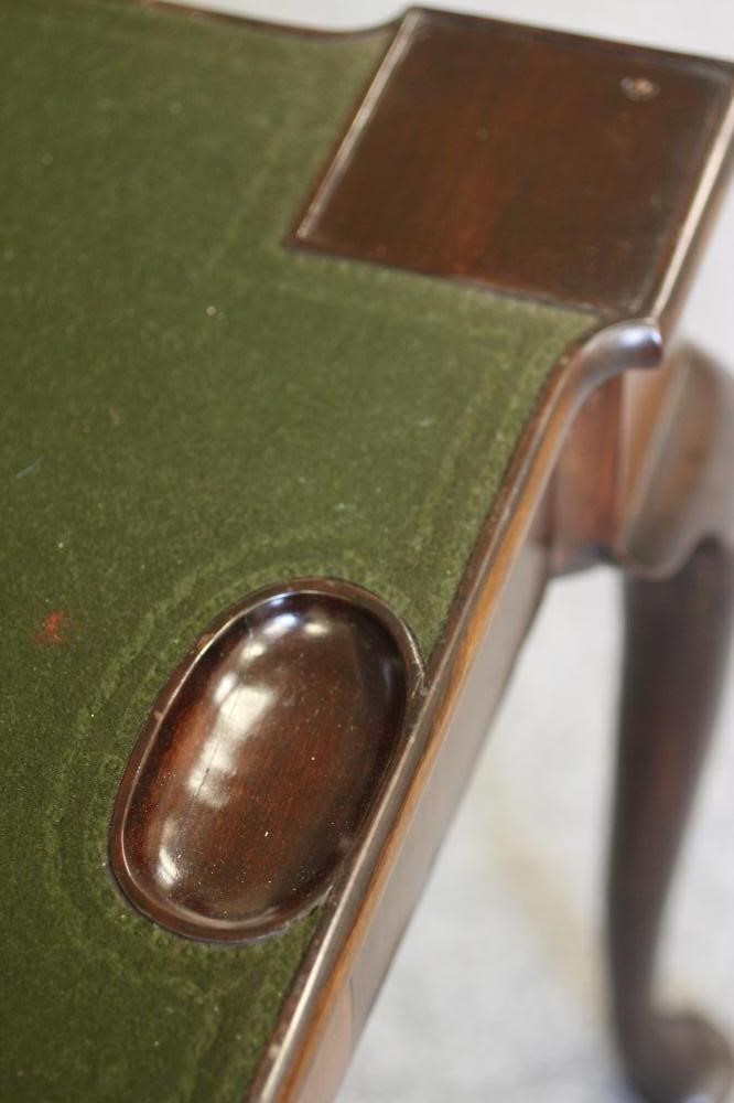 A GEORGE II MAHOGANY FOLDING CARD TABLE Image
