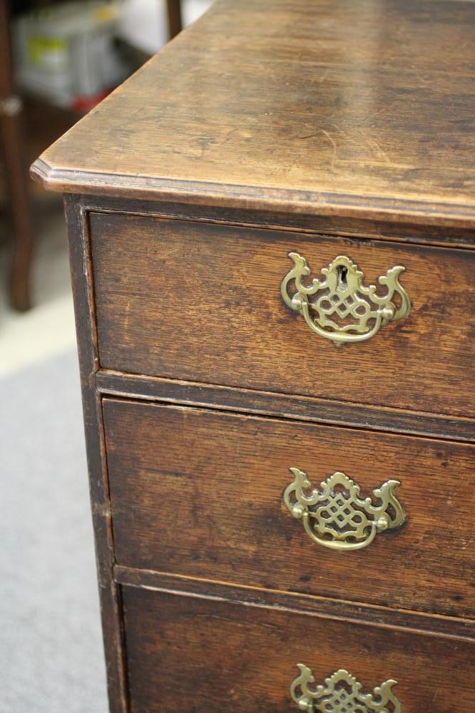 AN EARLY GEORGIAN OAK FLAT FRONTED CHEST Image
