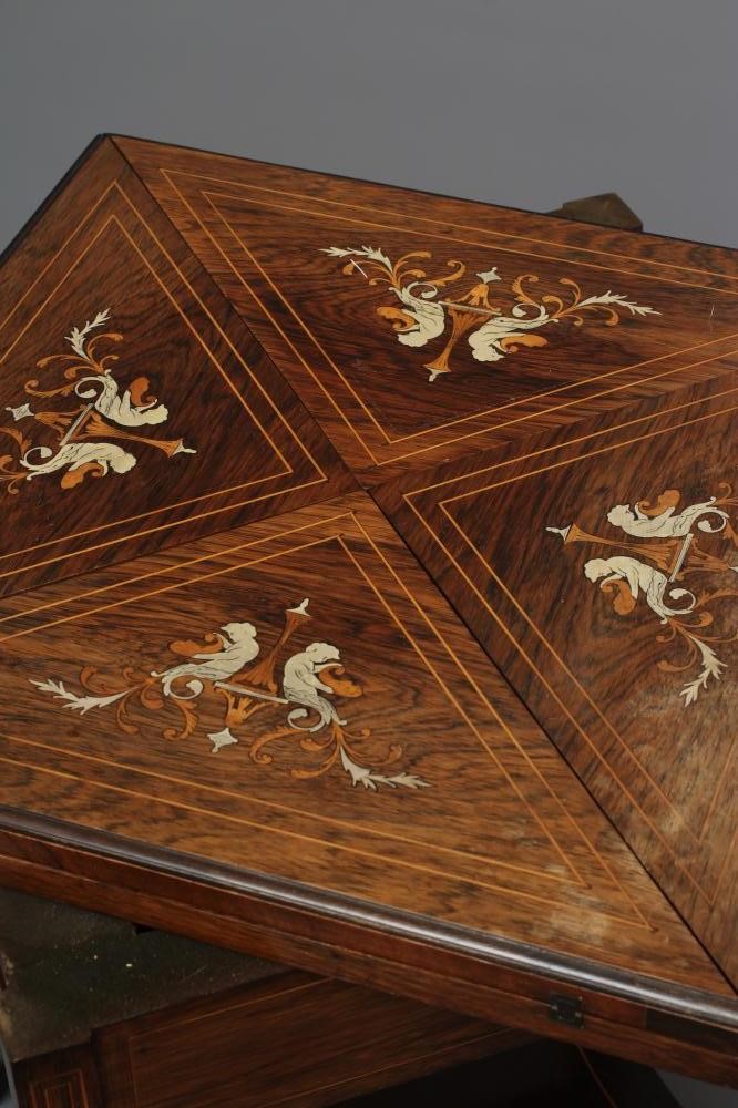 A VICTORIAN ROSEWOOD ENVELOPE CARD TABLE Image