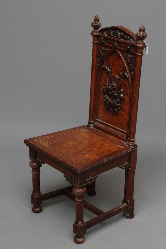 A VICTORIAN GOTHIC POLLARD OAK CARVED HALL CHAIR Image