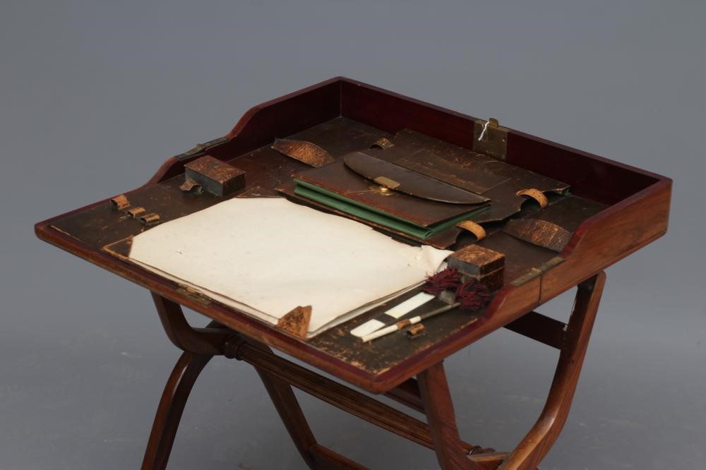 A MAHOGANY CAMPAIGN DESK Image