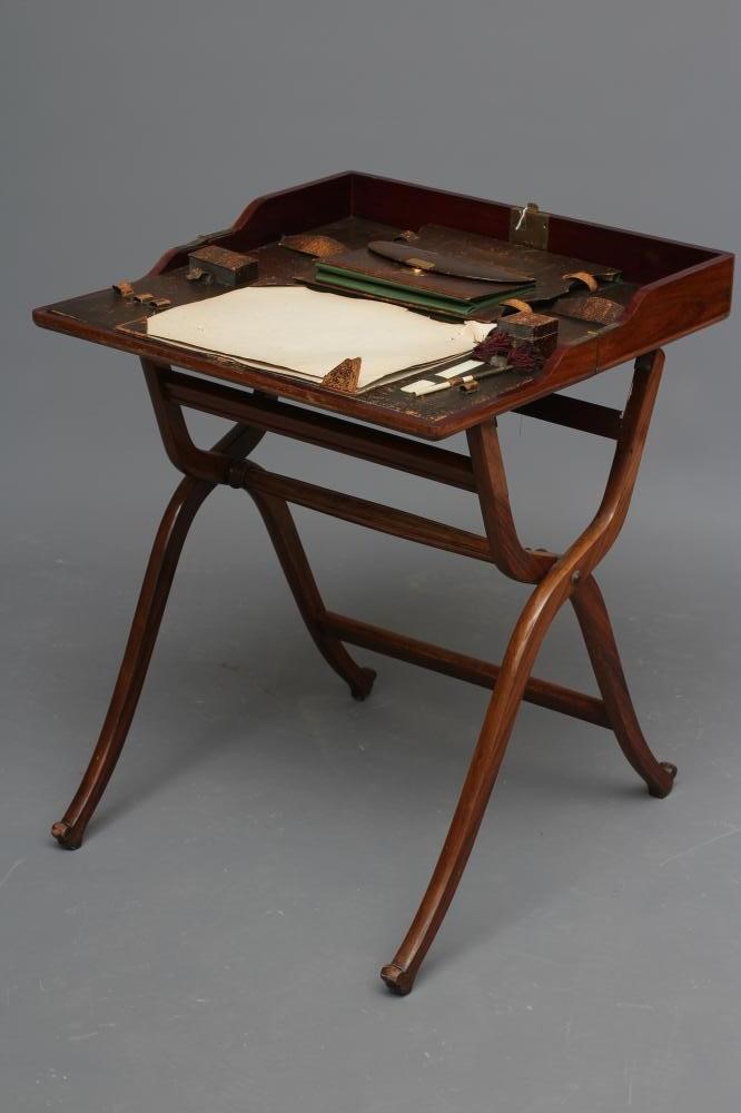 A MAHOGANY CAMPAIGN DESK Image