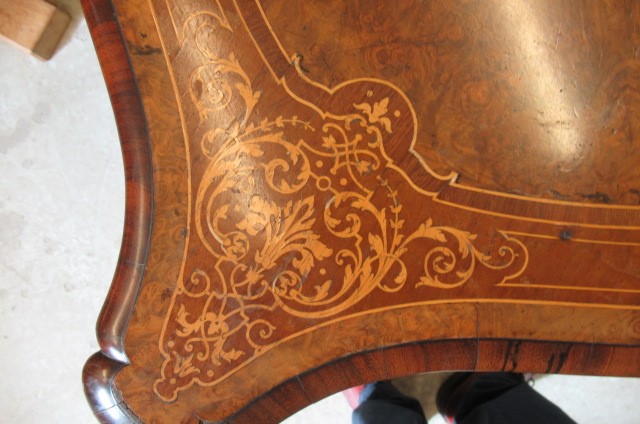 A VICTORIAN LOUIS XV STYLE BIRDS EYE MAPLE BUREAU PLAT with marquetry foliate sprays Image