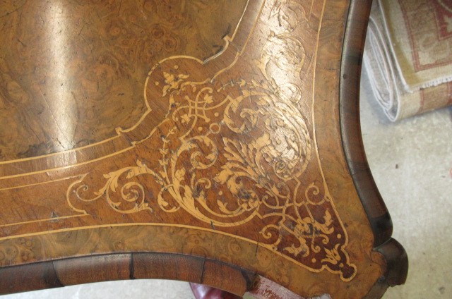 A VICTORIAN LOUIS XV STYLE BIRDS EYE MAPLE BUREAU PLAT with marquetry foliate sprays Image
