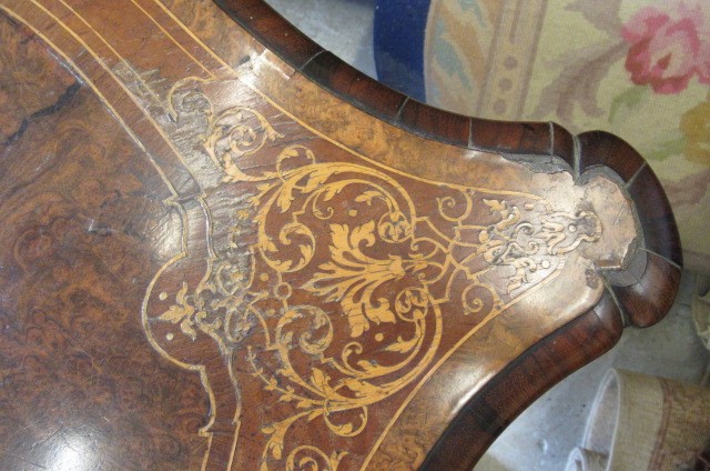 A VICTORIAN LOUIS XV STYLE BIRDS EYE MAPLE BUREAU PLAT with marquetry foliate sprays Image