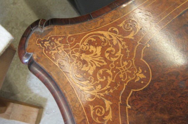 A VICTORIAN LOUIS XV STYLE BIRDS EYE MAPLE BUREAU PLAT with marquetry foliate sprays Image