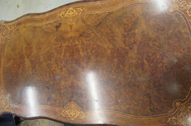 A VICTORIAN LOUIS XV STYLE BIRDS EYE MAPLE BUREAU PLAT with marquetry foliate sprays Image
