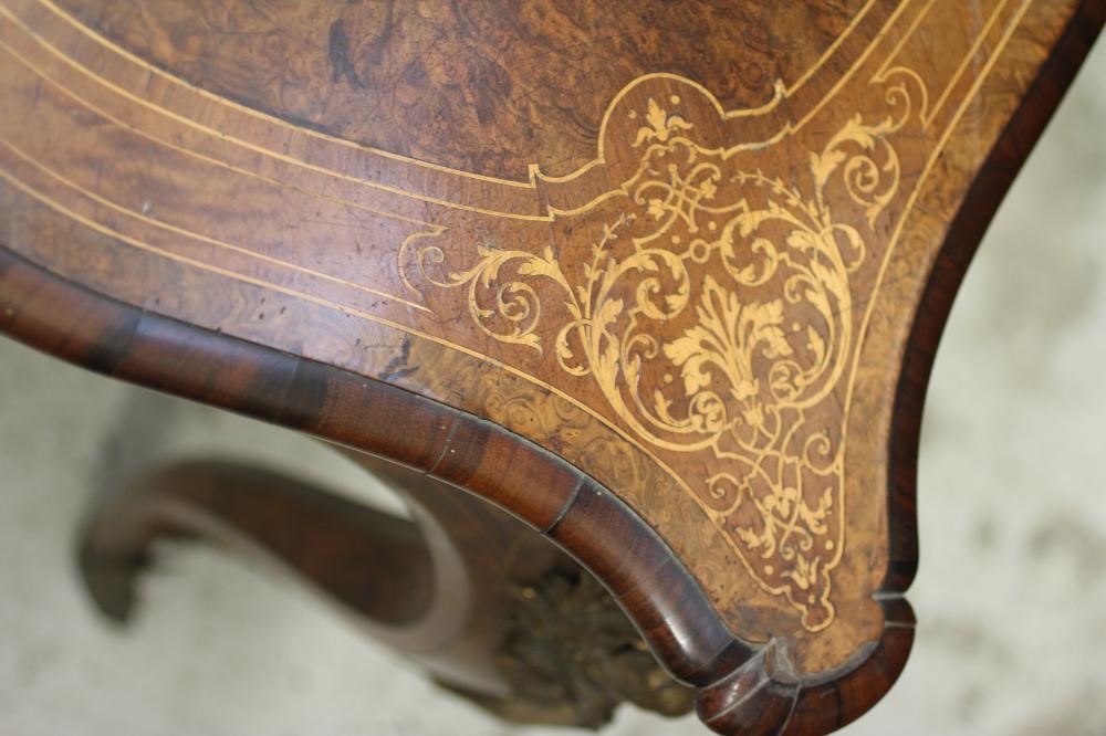 A VICTORIAN LOUIS XV STYLE BIRDS EYE MAPLE BUREAU PLAT with marquetry foliate sprays Image