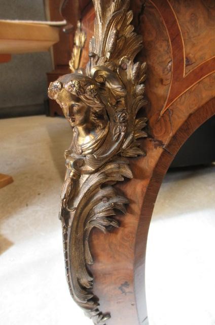 A VICTORIAN LOUIS XV STYLE BIRDS EYE MAPLE BUREAU PLAT with marquetry foliate sprays Image