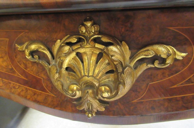 A VICTORIAN LOUIS XV STYLE BIRDS EYE MAPLE BUREAU PLAT with marquetry foliate sprays Image