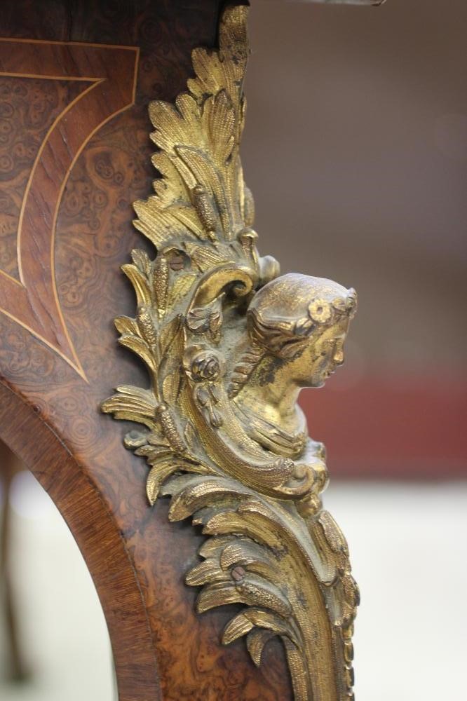 A VICTORIAN LOUIS XV STYLE BIRDS EYE MAPLE BUREAU PLAT with marquetry foliate sprays Image