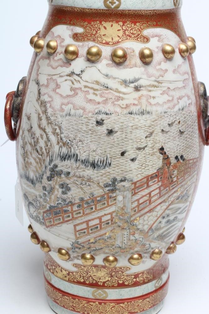 A JAPANESE PORCELAIN VASE of bombe cylindrical form with two fixed ring and rosette handles Image
