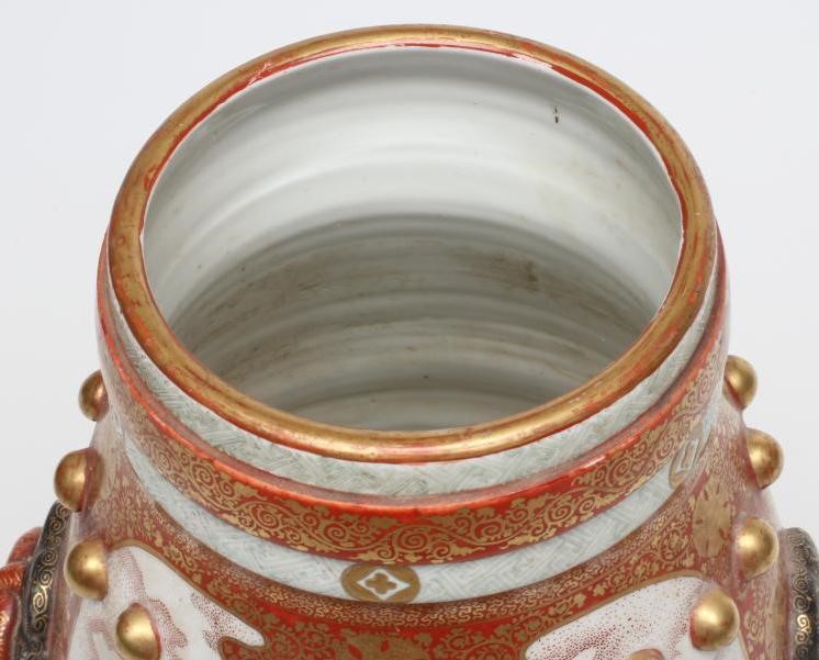 A JAPANESE PORCELAIN VASE of bombe cylindrical form with two fixed ring and rosette handles Image