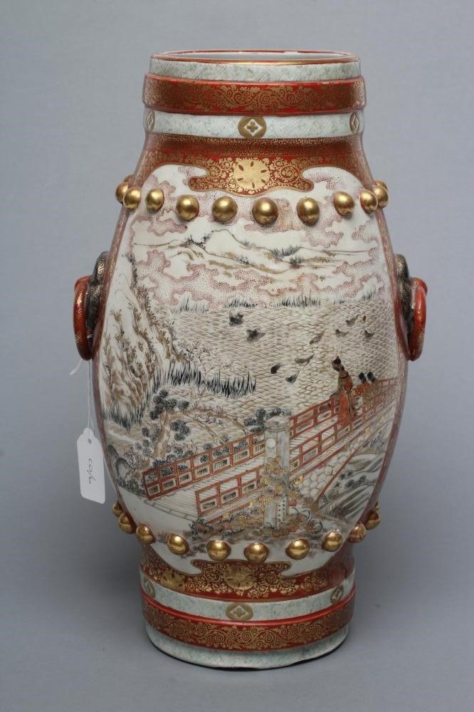 A JAPANESE PORCELAIN VASE of bombe cylindrical form with two fixed ring and rosette handles Image
