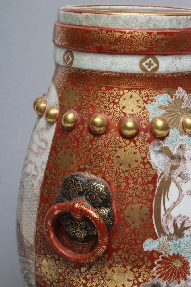 A JAPANESE PORCELAIN VASE of bombe cylindrical form with two fixed ring and rosette handles Image