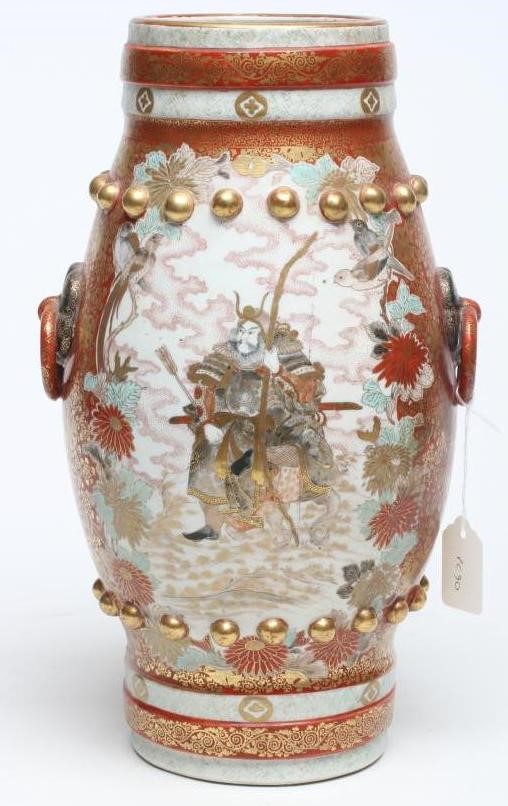 A JAPANESE PORCELAIN VASE of bombe cylindrical form with two fixed ring and rosette handles Image