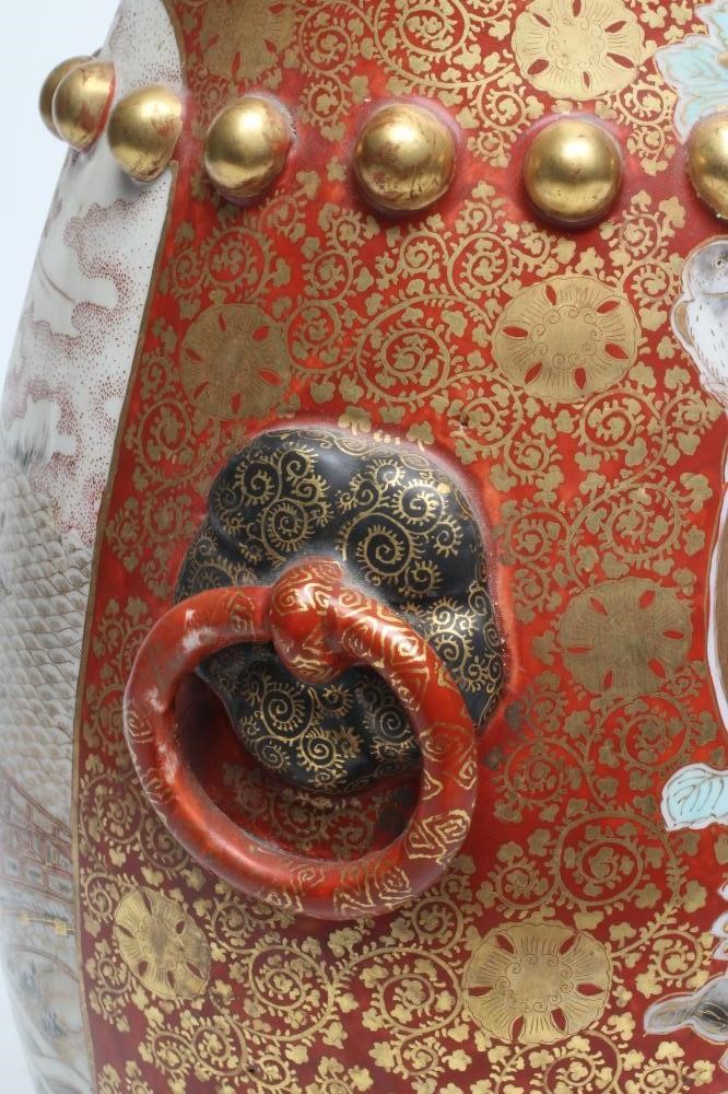 A JAPANESE PORCELAIN VASE of bombe cylindrical form with two fixed ring and rosette handles Image