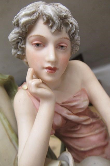 A PAIR OF ROYAL DUX FIGURAL VASES Image