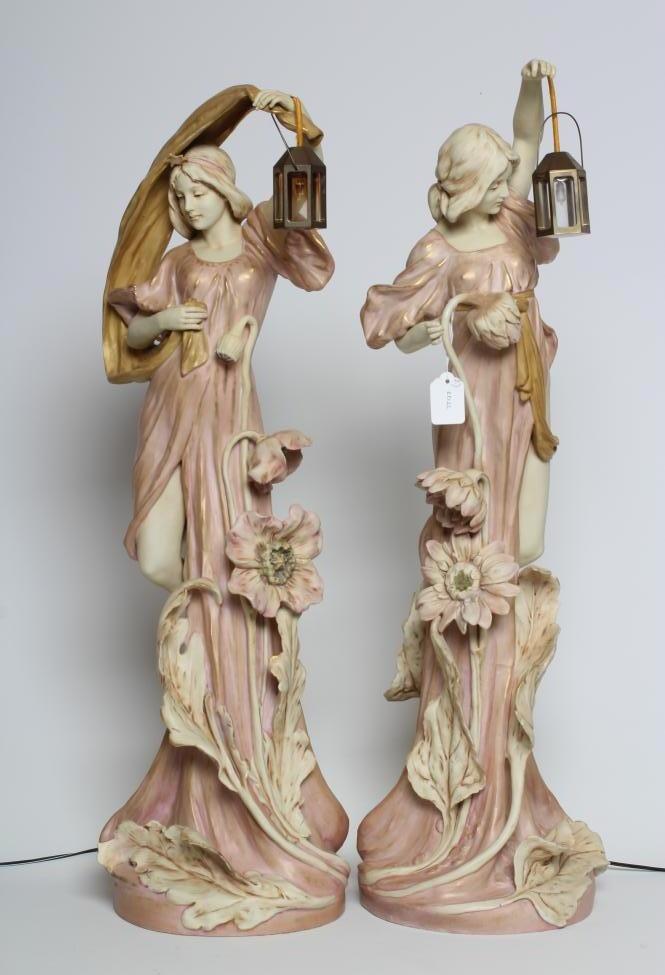 A LARGE PAIR OF ART NOUVEAU ROYAL DUX FIGURAL LANTERN FIGURES Image