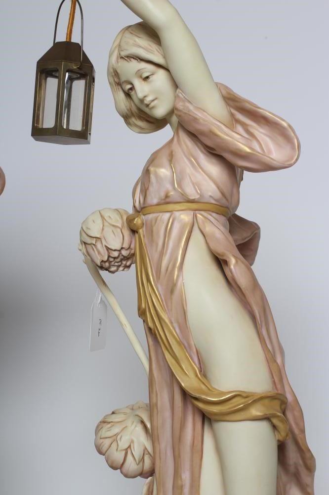 A LARGE PAIR OF ART NOUVEAU ROYAL DUX FIGURAL LANTERN FIGURES Image