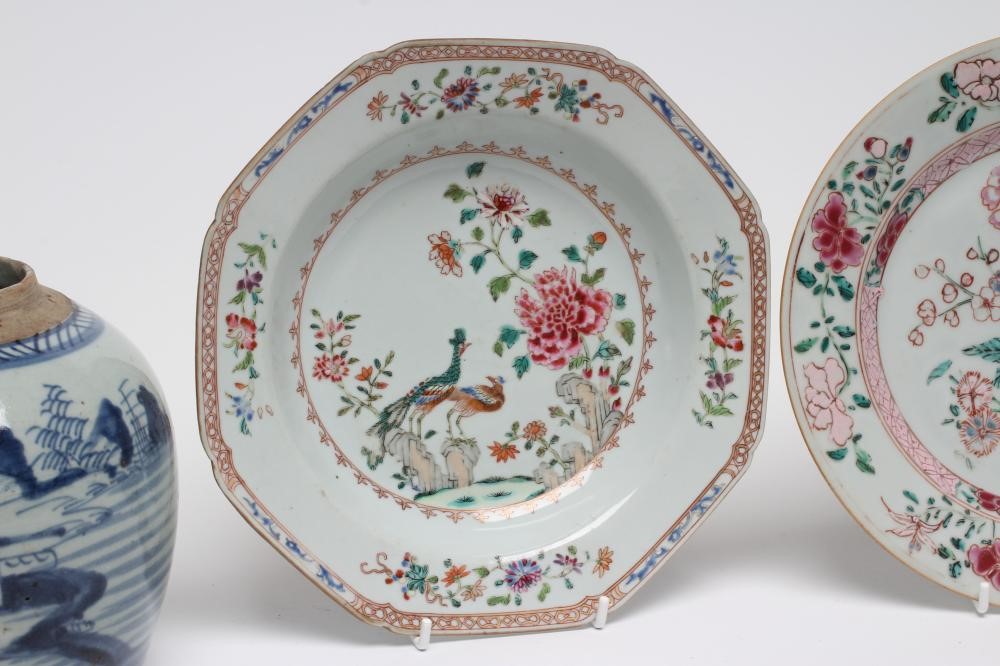 A CHINESE PORCELAIN OCTAGONAL SOUP PLATE painted in famille rose enamels with peacocks Image