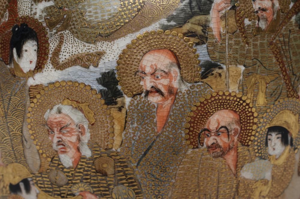 A SATSUMA EARTHENWARE VASE of rounded flared form with two dragon handles on a fixed "stand" and Image