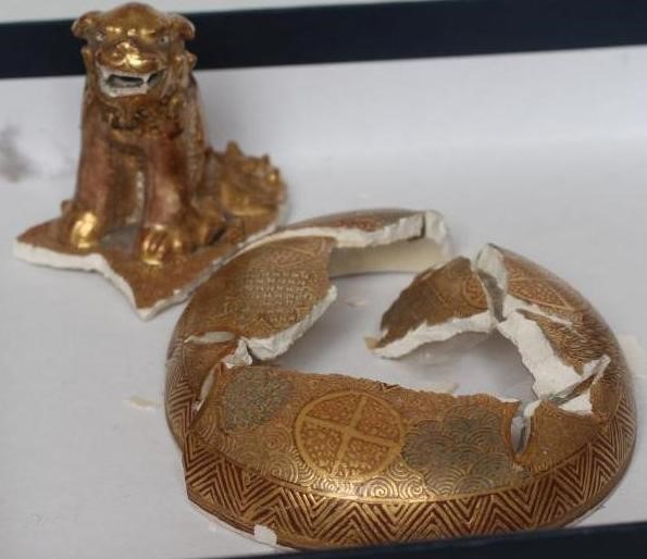 A SATSUMA EARTHENWARE VASE of rounded flared form with two dragon handles on a fixed "stand" and Image