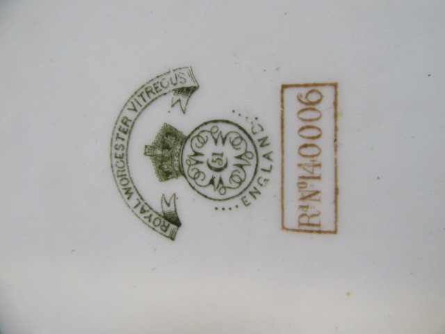 A SET OF TWELVE ROYAL WORCESTER VITREOUS CHINA PLATES Image