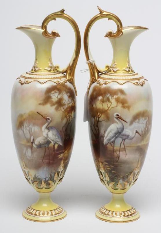 A PAIR OF ROYAL WORCESTER HADLEY WARE EWERS Image